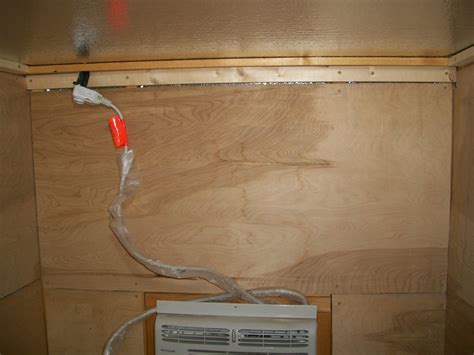 is it code to run extension cord into metal box|electrical extension cord through wall.